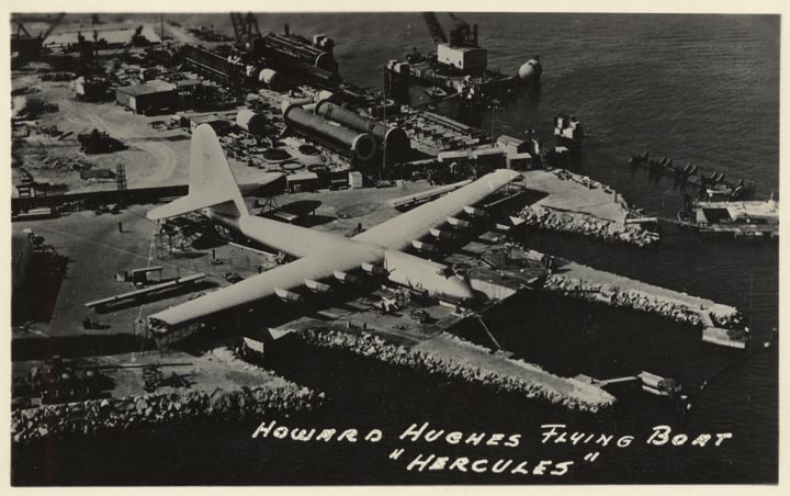 Howard Hughes "Hercules" flying boat. Super large, eight engine plane at airport