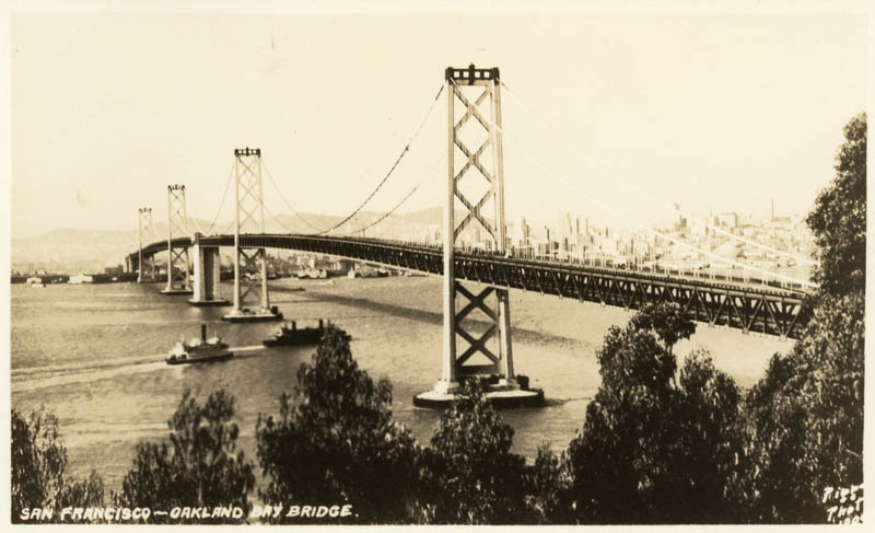 San Francisco-Oakland Bay Bridge with city in background.