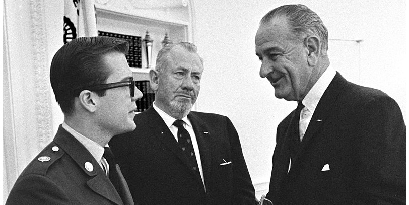 John Steinbeck, with his 19-year-old son John (left), visits his friend, President Johnson, in the Oval Office, May 16, 1966. John Jr. is shortly to leave for active duty in Vietnam.