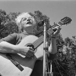 Malvina-Reynolds_Save-the-Park-rally-in-Golden-Gate-Park-to-stop-a-freeway-from-being-built-on-Panhandle-Parkway,-May-17,-1964