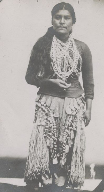 Shows Mrs. Thompson in native dress. Handwritten on verso -- "This picture was taken on a Tin Tipe plate the day after my marriage to M. J. Thompson Indian Law and from the tin tipe to this photograph and from this to the picture in my book