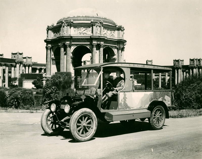 Shows California State Automobile Association (AAA) service truck in front of Palace of Fine Arts. "We are signing the Victory Highway San Francisco to NY" -- on truck.