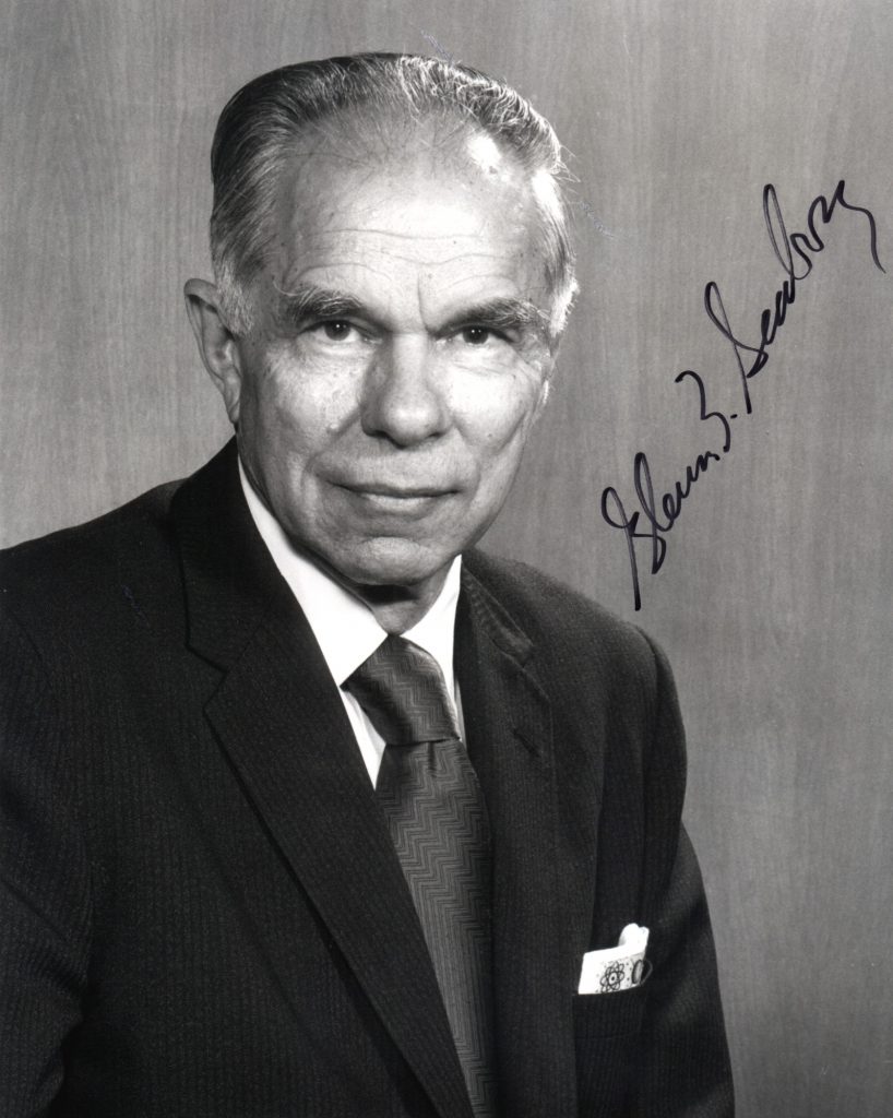 Shows an autographed bust length portrait of Glenn T. Seaborg